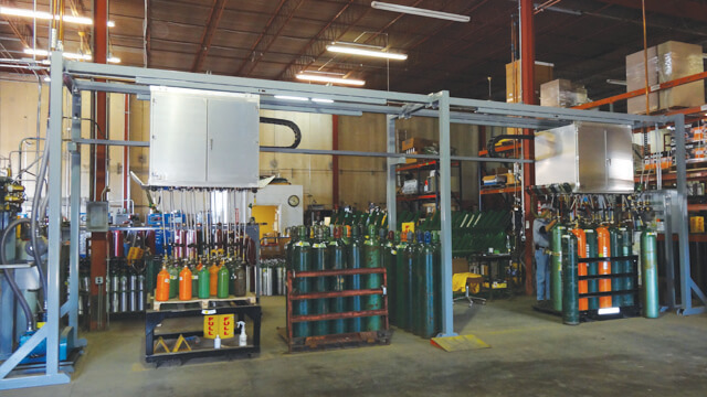 variety of gas cylinders in gas packs and gas pallets