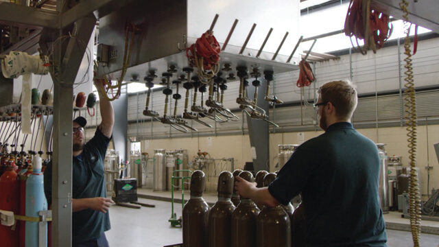 man using a automated fill system at Holston Gas