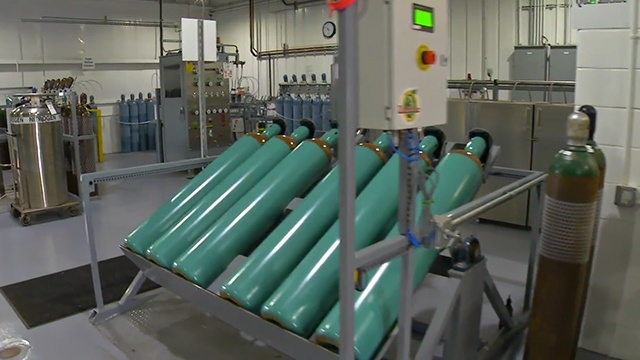 gas cylinders in a holding rack
