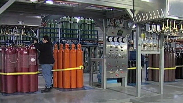 Weldcoa automated fill station with a variety of gas cylinders